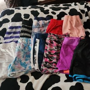 LARGE LOT OF WOMENS SIZE LARGE RUNNING SHORTS